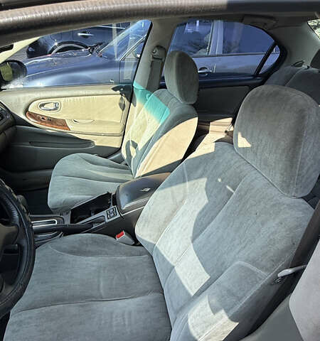 Зеленый Ниссан Максима, объемом двигателя 2 л и пробегом 560 тыс. км за 4000 $, фото 7 на Automoto.ua