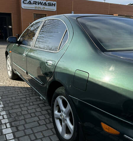 Зеленый Ниссан Максима, объемом двигателя 2 л и пробегом 560 тыс. км за 4000 $, фото 10 на Automoto.ua