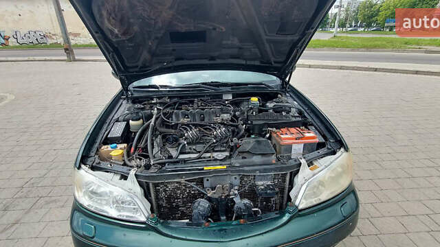 Зеленый Ниссан Максима, объемом двигателя 2 л и пробегом 298 тыс. км за 2998 $, фото 13 на Automoto.ua