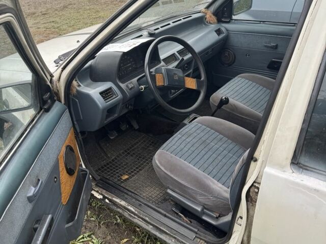 Білий Ніссан Мікра, об'ємом двигуна 1 л та пробігом 200 тис. км за 384 $, фото 1 на Automoto.ua