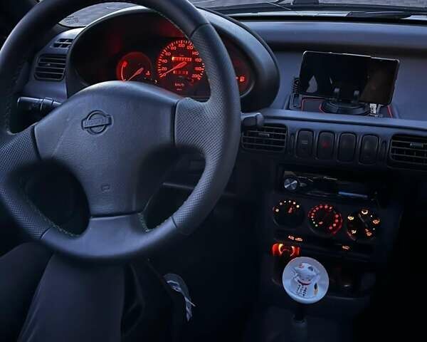 Белый Ниссан Микра, объемом двигателя 1 л и пробегом 190 тыс. км за 5999 $, фото 2 на Automoto.ua