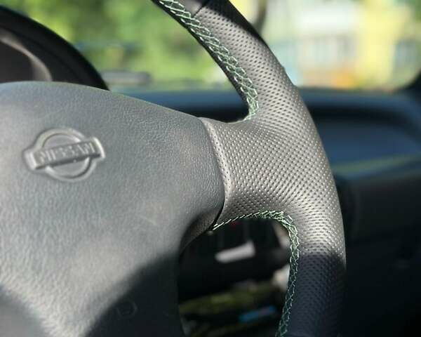 Белый Ниссан Микра, объемом двигателя 1 л и пробегом 190 тыс. км за 5999 $, фото 12 на Automoto.ua