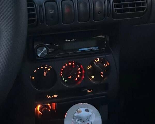 Белый Ниссан Микра, объемом двигателя 1 л и пробегом 190 тыс. км за 5999 $, фото 1 на Automoto.ua