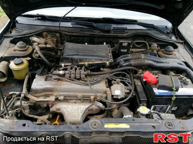 Чорний Ніссан Мікра, об'ємом двигуна 1 л та пробігом 220 тис. км за 1550 $, фото 6 на Automoto.ua