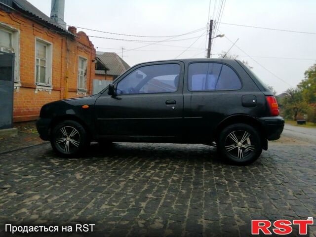 Чорний Ніссан Мікра, об'ємом двигуна 1 л та пробігом 220 тис. км за 1550 $, фото 4 на Automoto.ua