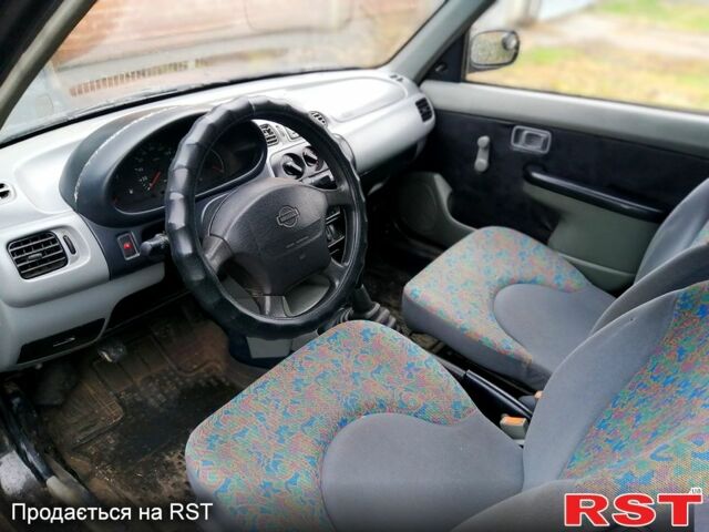 Чорний Ніссан Мікра, об'ємом двигуна 1 л та пробігом 220 тис. км за 1550 $, фото 5 на Automoto.ua