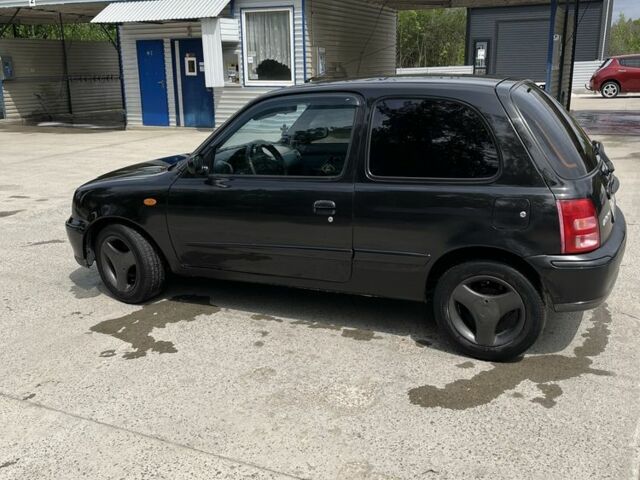 Черный Ниссан Микра, объемом двигателя 1 л и пробегом 260 тыс. км за 2800 $, фото 3 на Automoto.ua