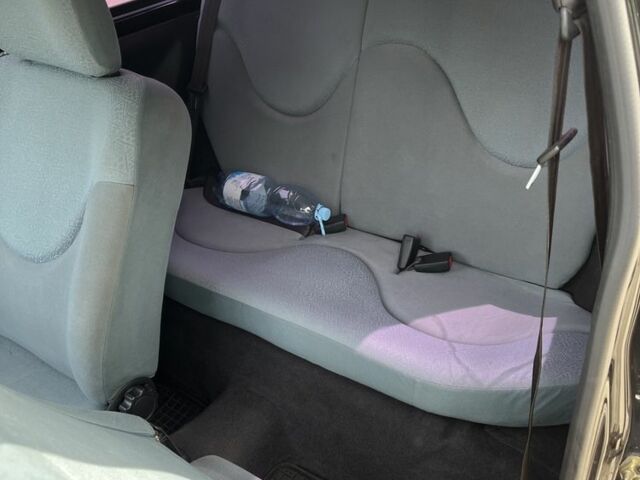 Черный Ниссан Микра, объемом двигателя 1 л и пробегом 260 тыс. км за 2800 $, фото 5 на Automoto.ua