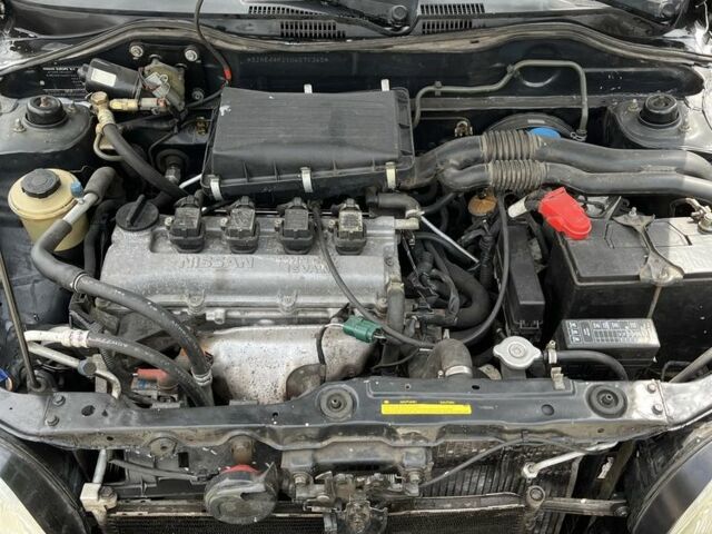 Черный Ниссан Микра, объемом двигателя 1 л и пробегом 260 тыс. км за 2800 $, фото 7 на Automoto.ua