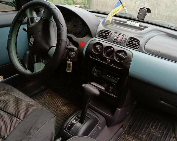 Чорний Ніссан Мікра, об'ємом двигуна 1 л та пробігом 188 тис. км за 2200 $, фото 8 на Automoto.ua