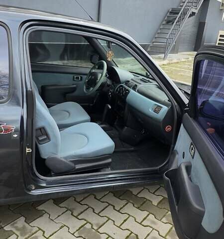 Черный Ниссан Микра, объемом двигателя 1 л и пробегом 188 тыс. км за 2499 $, фото 15 на Automoto.ua