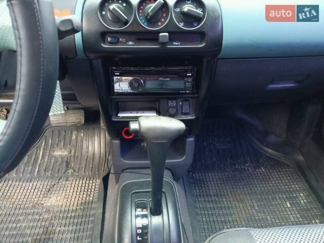 Чорний Ніссан Мікра, об'ємом двигуна 1 л та пробігом 188 тис. км за 2200 $, фото 10 на Automoto.ua