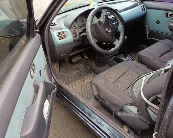 Чорний Ніссан Мікра, об'ємом двигуна 1 л та пробігом 188 тис. км за 2200 $, фото 11 на Automoto.ua