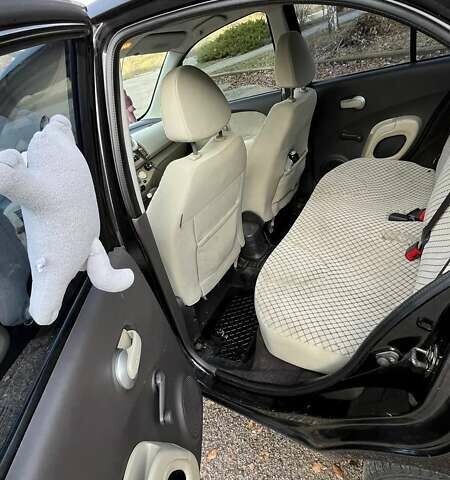 Черный Ниссан Микра, объемом двигателя 1.39 л и пробегом 191 тыс. км за 6000 $, фото 11 на Automoto.ua