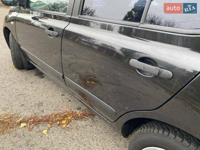 Чорний Ніссан Мікра, об'ємом двигуна 1.2 л та пробігом 169 тис. км за 4999 $, фото 12 на Automoto.ua