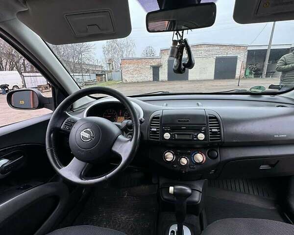 Чорний Ніссан Мікра, об'ємом двигуна 1.24 л та пробігом 185 тис. км за 4099 $, фото 10 на Automoto.ua