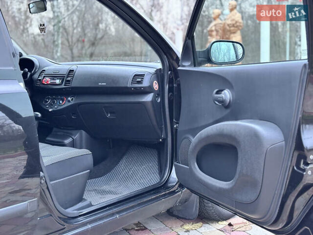 Чорний Ніссан Мікра, об'ємом двигуна 1.24 л та пробігом 169 тис. км за 5550 $, фото 16 на Automoto.ua