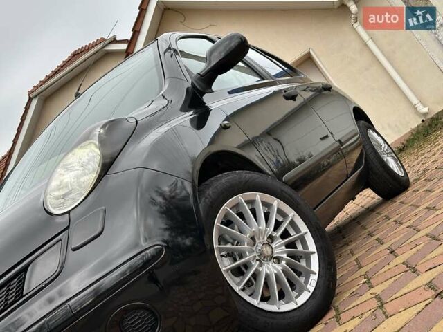 Черный Ниссан Микра, объемом двигателя 1.24 л и пробегом 148 тыс. км за 5999 $, фото 4 на Automoto.ua