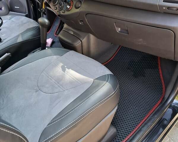 Черный Ниссан Микра, объемом двигателя 1.24 л и пробегом 188 тыс. км за 6400 $, фото 7 на Automoto.ua
