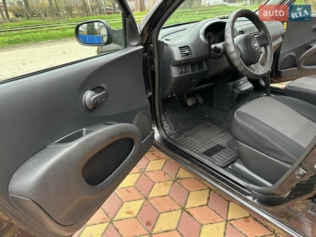 Черный Ниссан Микра, объемом двигателя 1.24 л и пробегом 148 тыс. км за 5999 $, фото 44 на Automoto.ua