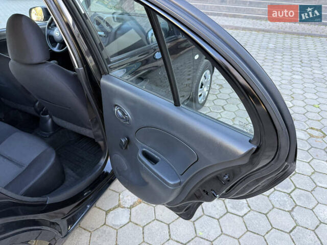 Черный Ниссан Микра, объемом двигателя 1.24 л и пробегом 77 тыс. км за 8250 $, фото 53 на Automoto.ua