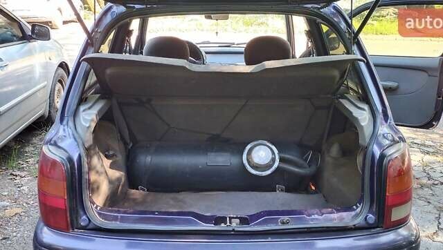 Фиолетовый Ниссан Микра, объемом двигателя 1 л и пробегом 277 тыс. км за 1700 $, фото 1 на Automoto.ua