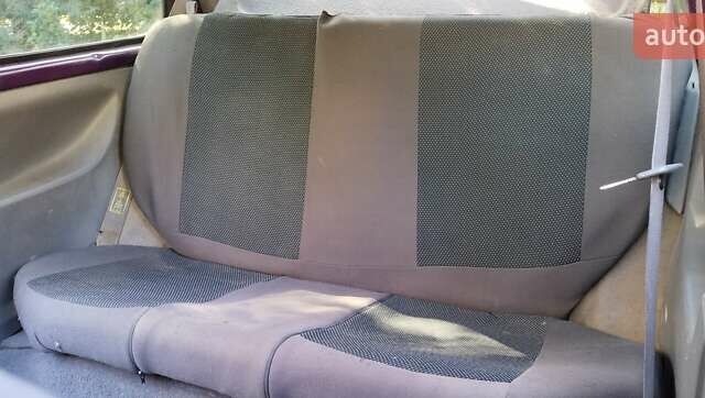 Фиолетовый Ниссан Микра, объемом двигателя 1 л и пробегом 277 тыс. км за 1700 $, фото 2 на Automoto.ua