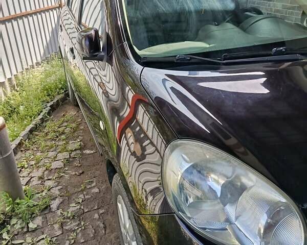 Фиолетовый Ниссан Микра, объемом двигателя 1.2 л и пробегом 141 тыс. км за 5400 $, фото 15 на Automoto.ua