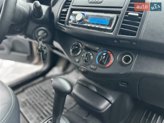 Коричневий Ніссан Мікра, об'ємом двигуна 1.24 л та пробігом 119 тис. км за 6200 $, фото 32 на Automoto.ua