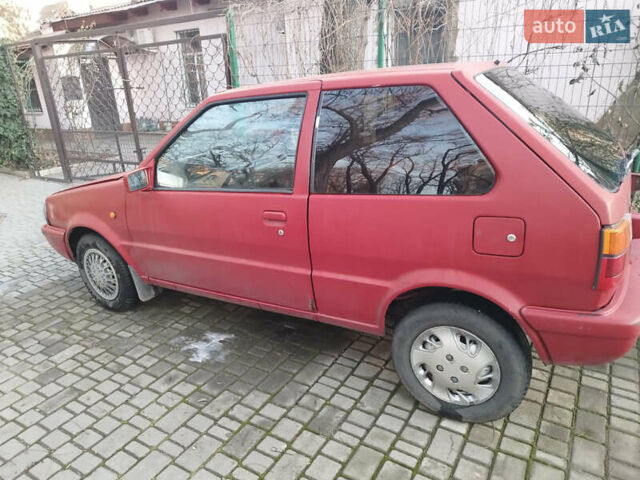 Червоний Ніссан Мікра, об'ємом двигуна 1 л та пробігом 432 тис. км за 1300 $, фото 1 на Automoto.ua