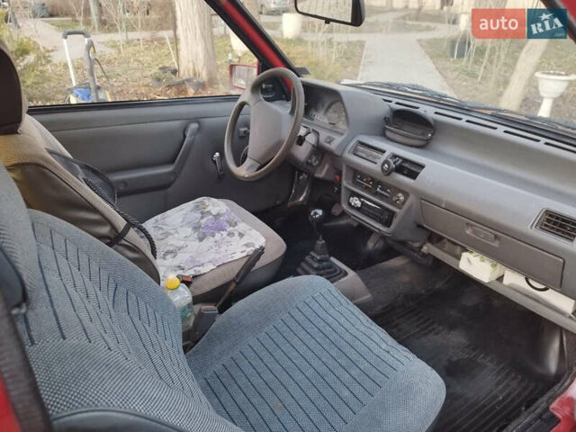 Червоний Ніссан Мікра, об'ємом двигуна 1 л та пробігом 432 тис. км за 1300 $, фото 3 на Automoto.ua