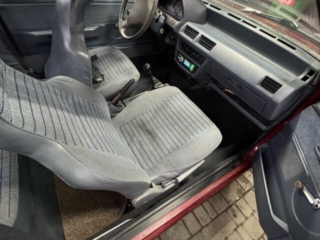 Червоний Ніссан Мікра, об'ємом двигуна 1 л та пробігом 455 тис. км за 950 $, фото 6 на Automoto.ua