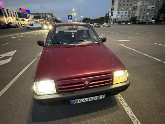 Червоний Ніссан Мікра, об'ємом двигуна 1 л та пробігом 455 тис. км за 950 $, фото 1 на Automoto.ua