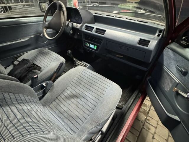 Червоний Ніссан Мікра, об'ємом двигуна 1 л та пробігом 455 тис. км за 950 $, фото 9 на Automoto.ua