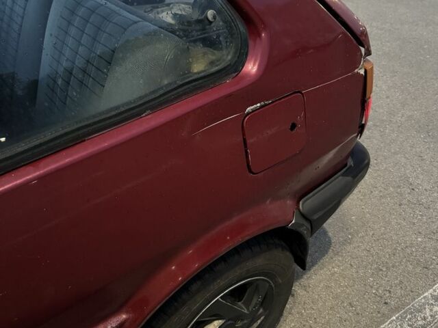 Червоний Ніссан Мікра, об'ємом двигуна 1 л та пробігом 455 тис. км за 950 $, фото 5 на Automoto.ua