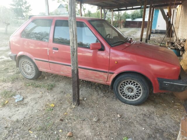 Красный Ниссан Микра, объемом двигателя 1 л и пробегом 2 тыс. км за 815 $, фото 2 на Automoto.ua