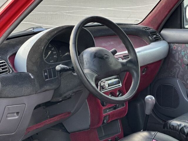 Червоний Ніссан Мікра, об'ємом двигуна 1 л та пробігом 230 тис. км за 1499 $, фото 9 на Automoto.ua