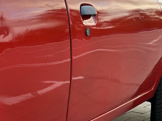 Червоний Ніссан Мікра, об'ємом двигуна 1 л та пробігом 230 тис. км за 1499 $, фото 6 на Automoto.ua