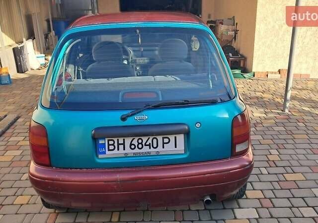 Красный Ниссан Микра, объемом двигателя 1 л и пробегом 300 тыс. км за 1700 $, фото 2 на Automoto.ua