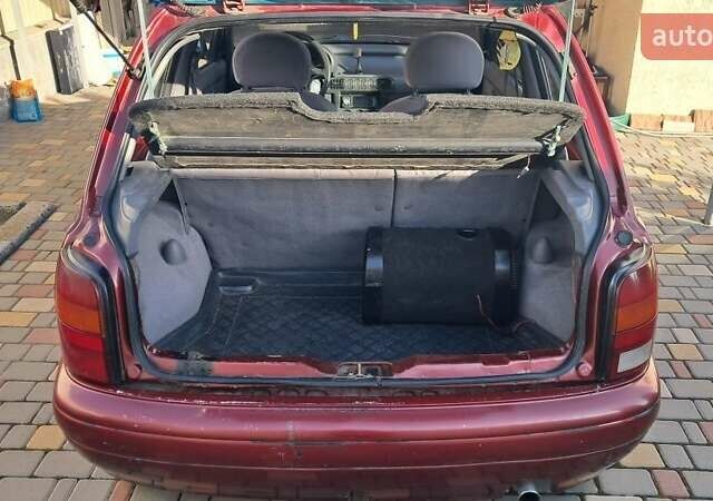 Красный Ниссан Микра, объемом двигателя 1 л и пробегом 300 тыс. км за 1700 $, фото 9 на Automoto.ua