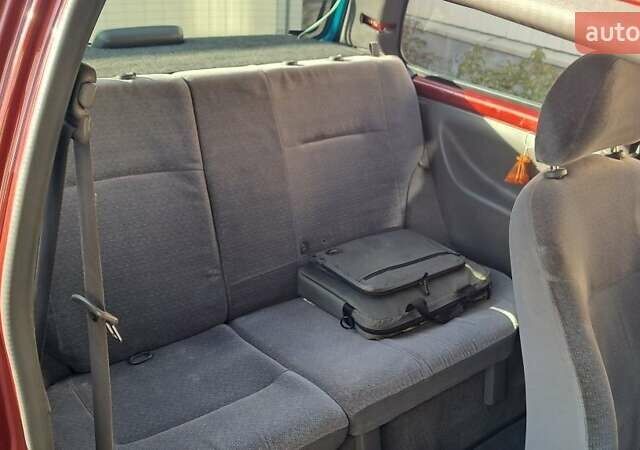 Красный Ниссан Микра, объемом двигателя 1 л и пробегом 300 тыс. км за 1700 $, фото 6 на Automoto.ua