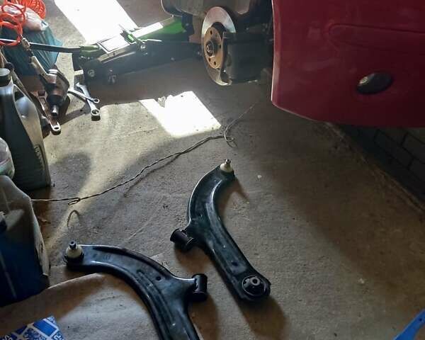 Красный Ниссан Микра, объемом двигателя 1.24 л и пробегом 190 тыс. км за 5599 $, фото 8 на Automoto.ua