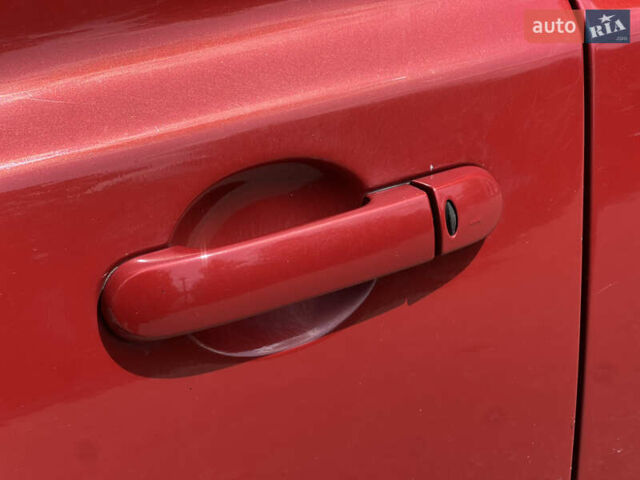 Червоний Ніссан Мікра, об'ємом двигуна 1.39 л та пробігом 200 тис. км за 4599 $, фото 9 на Automoto.ua