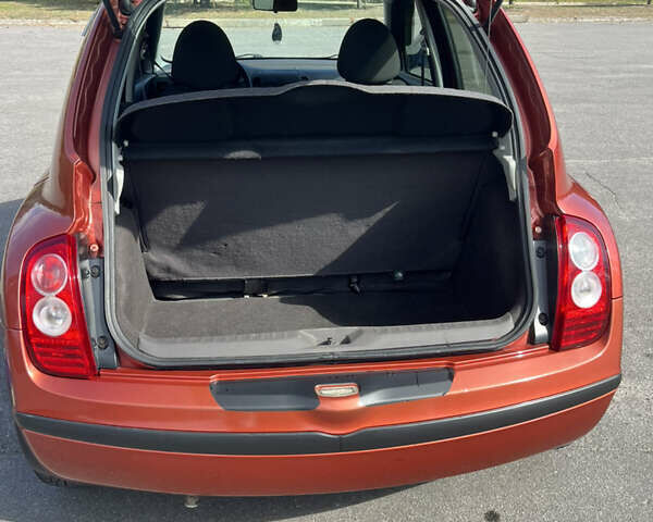 Червоний Ніссан Мікра, об'ємом двигуна 1.24 л та пробігом 140 тис. км за 7200 $, фото 11 на Automoto.ua