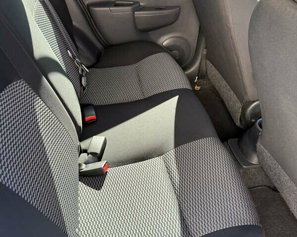 Червоний Ніссан Мікра, об'ємом двигуна 1.6 л та пробігом 50 тис. км за 7999 $, фото 15 на Automoto.ua