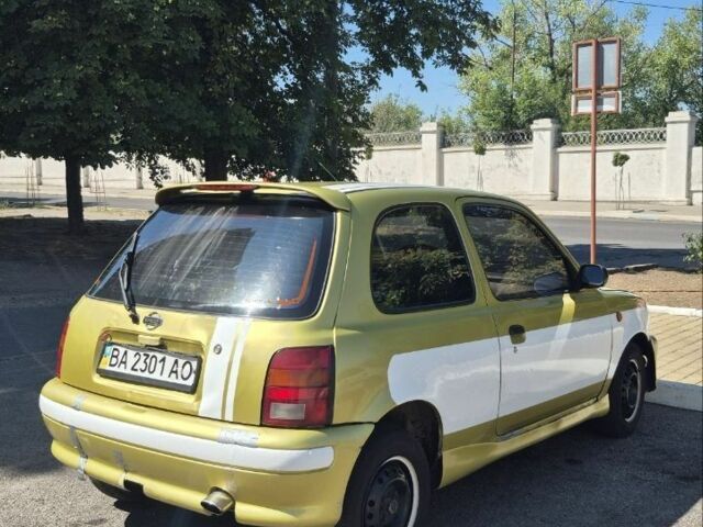 Желтый Ниссан Микра, объемом двигателя 1 л и пробегом 242 тыс. км за 699 $, фото 4 на Automoto.ua