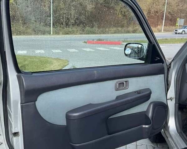 Сірий Ніссан Мікра, об'ємом двигуна 1 л та пробігом 240 тис. км за 2600 $, фото 12 на Automoto.ua