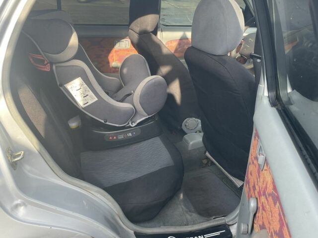 Серый Ниссан Микра, объемом двигателя 1 л и пробегом 240 тыс. км за 1500 $, фото 5 на Automoto.ua