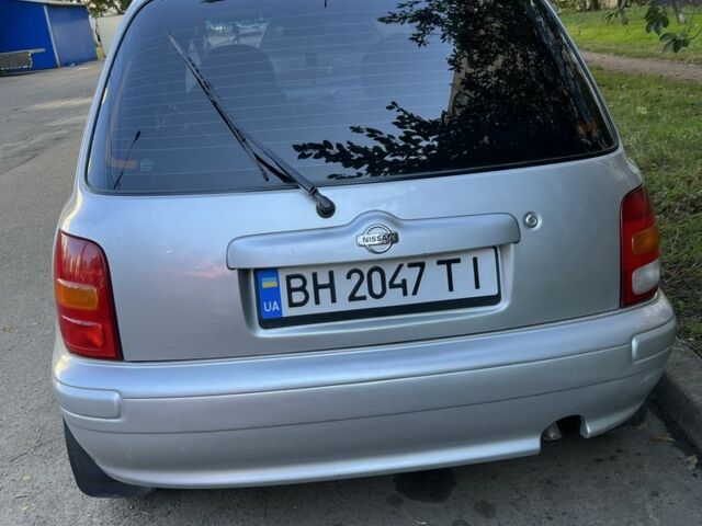 Серый Ниссан Микра, объемом двигателя 1 л и пробегом 203 тыс. км за 3000 $, фото 4 на Automoto.ua