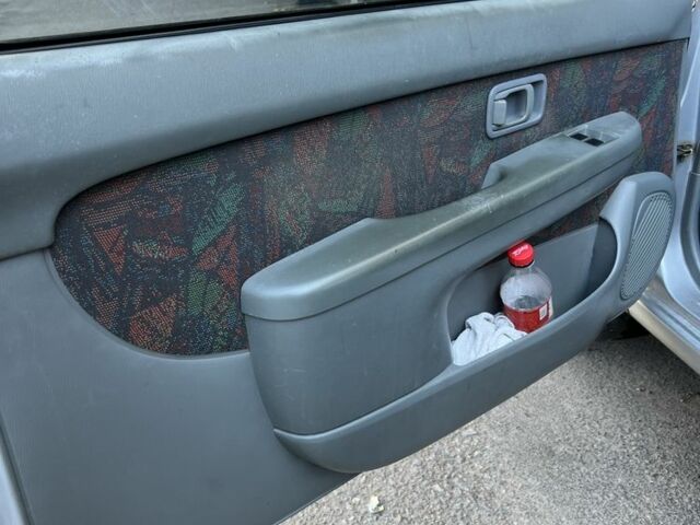 Серый Ниссан Микра, объемом двигателя 1 л и пробегом 203 тыс. км за 3000 $, фото 10 на Automoto.ua